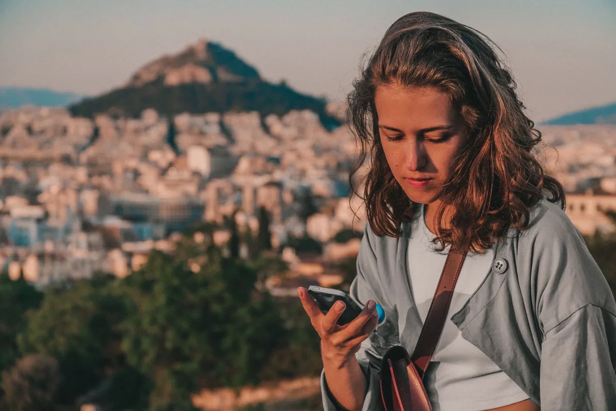 A personal safety alarm, like this compact device, is a small but powerful tool for solo travelers. 