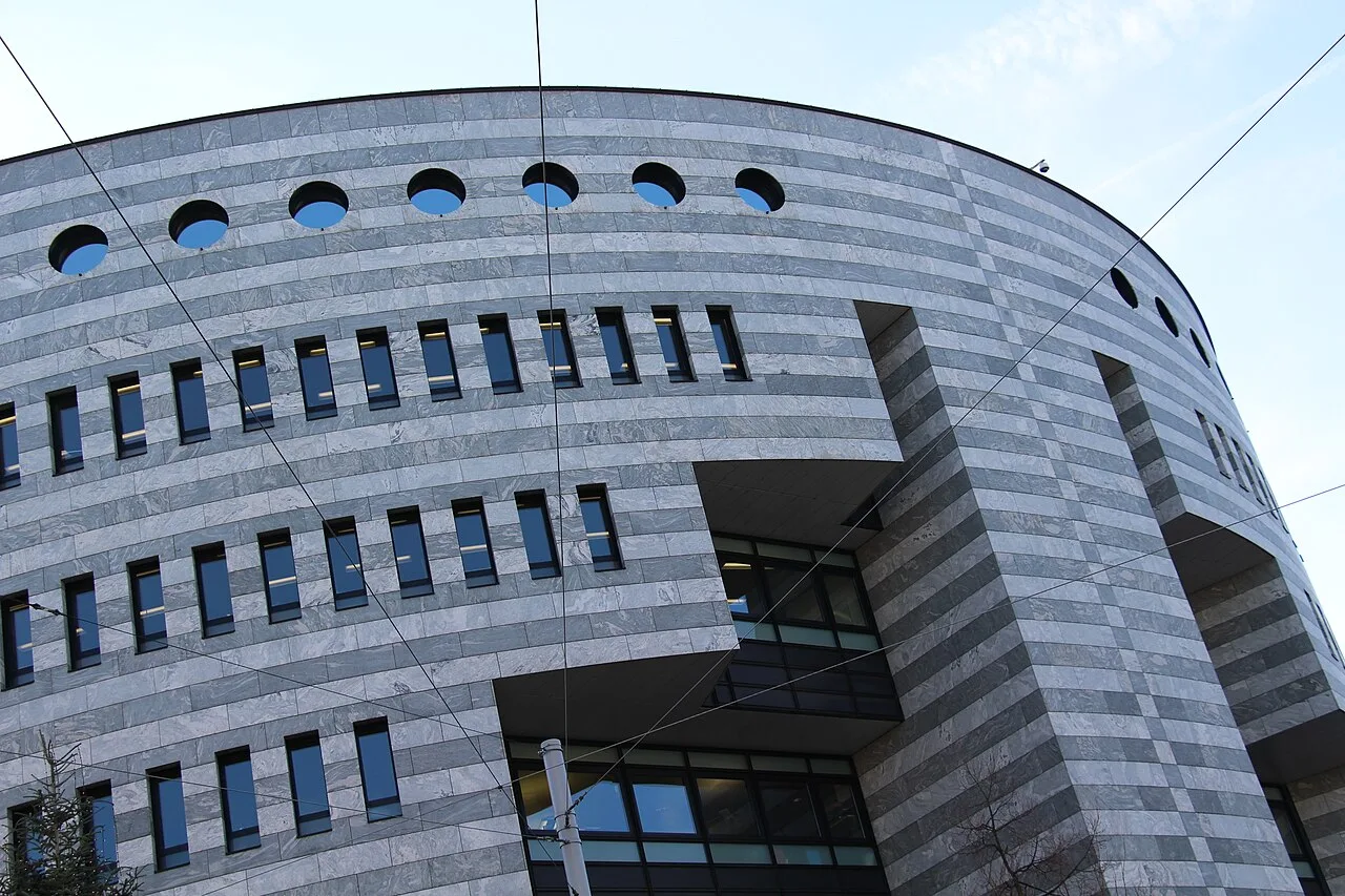 The headquarters of the Bank for International Settlements (BIS) in Basel, Switzerland, a key institution involved in discussions around responsible AI in finance.