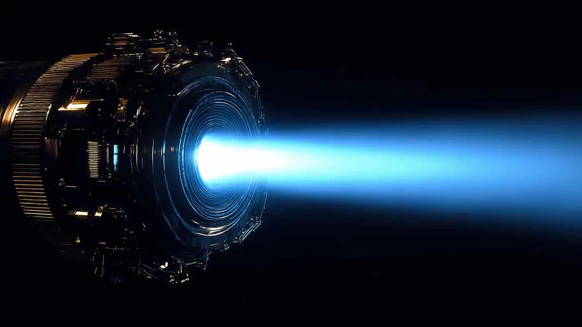 An operational ion thruster, like this one, uses electricity to accelerate charged particles, creati