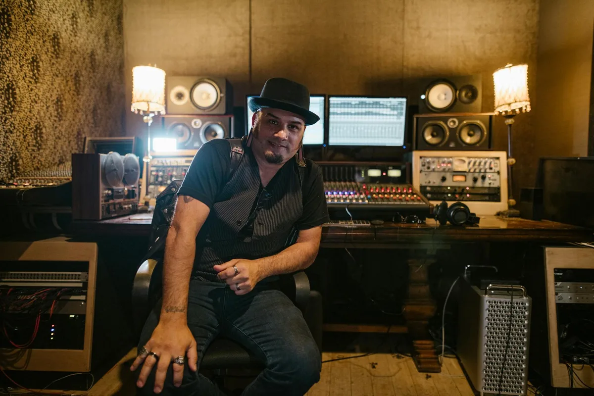 John Alagia, a seasoned producer known for his work with Dave Matthews Band and Jason Mraz, played a