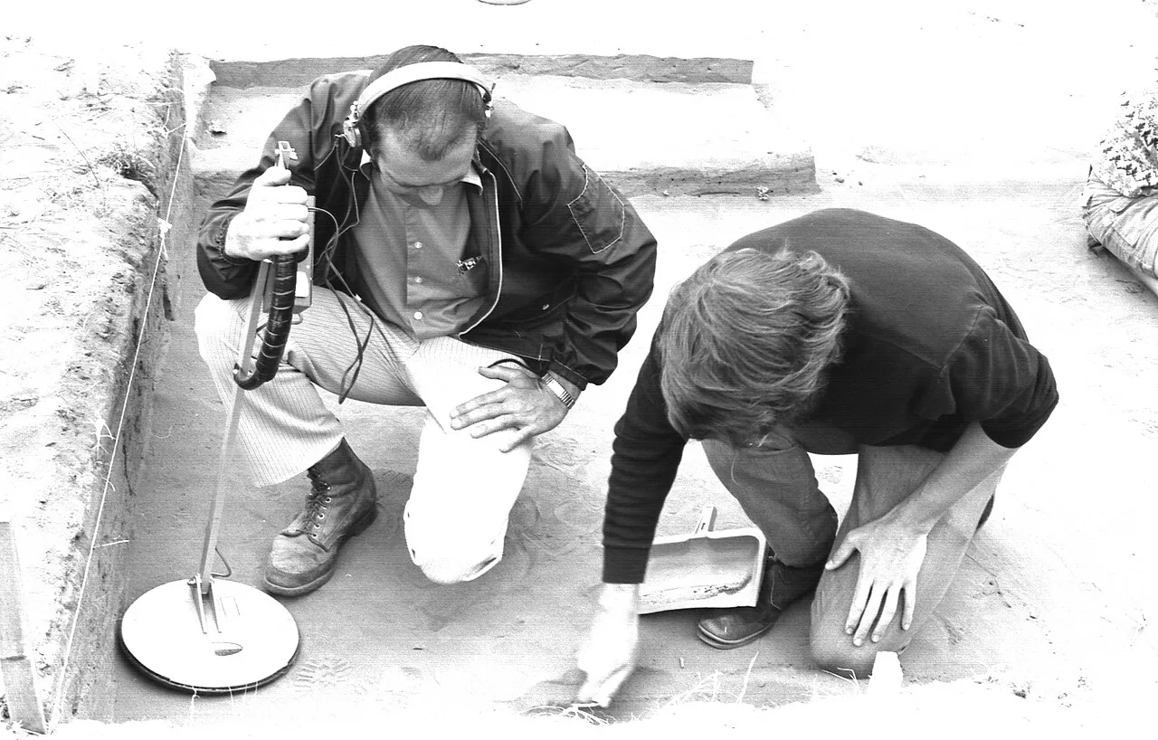 Archaeologists using Ground-Penetrating Radar (GPR) to map subsurface features, a key non-invasive technique for locating lost cities.