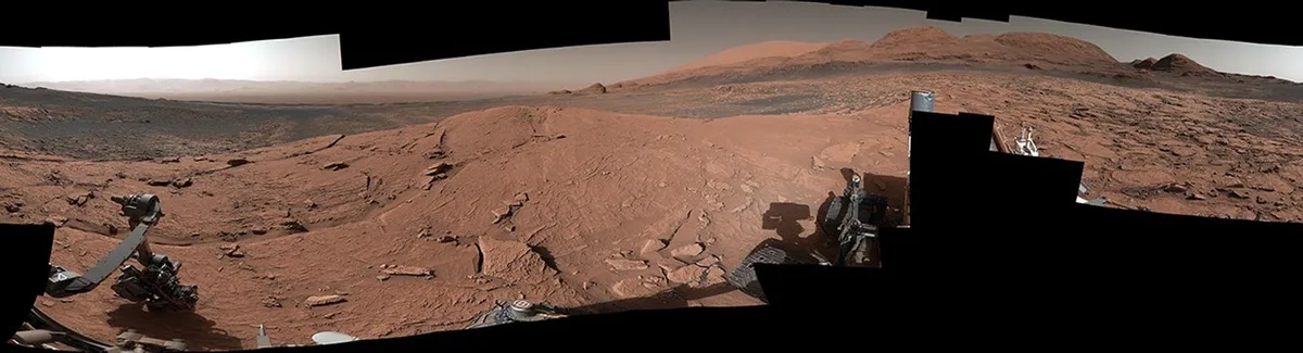 The Curiosity rover, seen here exploring Gale Crater, represents past robotic missions that prioriti