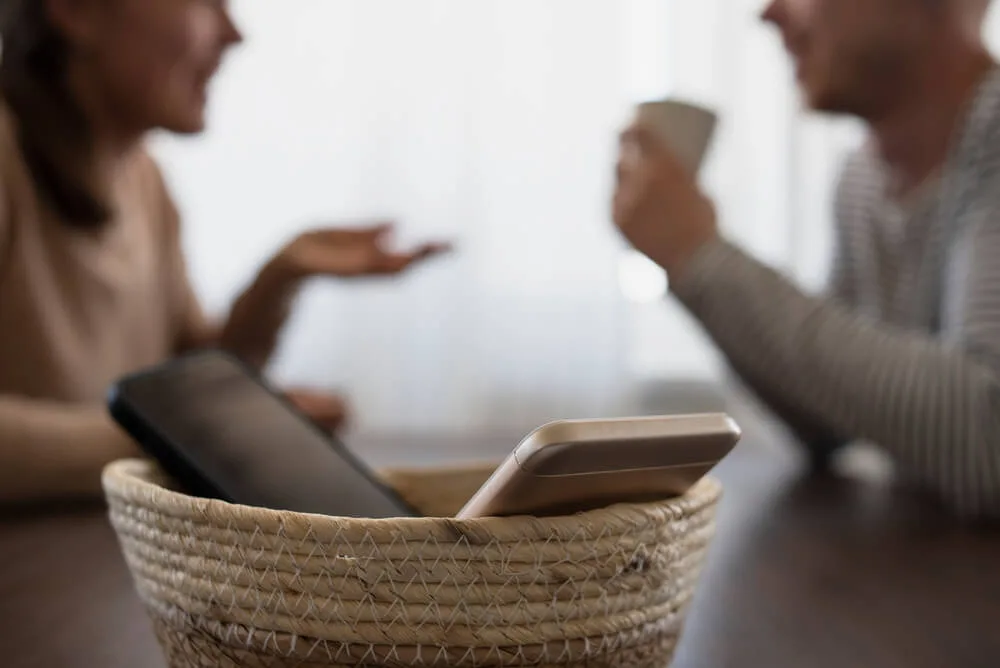 A pivotal moment at many digital detox retreats involves guests surrendering their smartphones and o