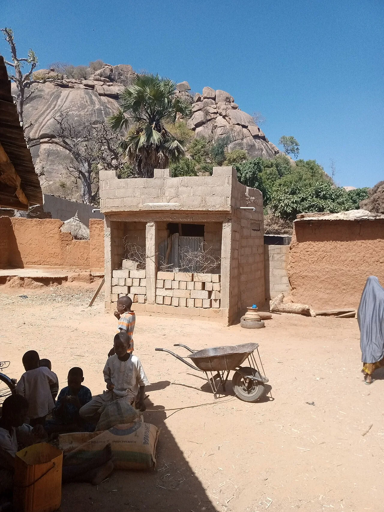 A typical rural village in Africa, representing the remote populations that could benefit significantly from VR-enhanced telemedicine.