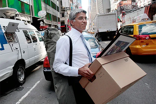 The iconic scene of Lehman Brothers employees leaving their New York City headquarters with boxes on