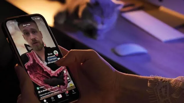 A TikTok feed, characterized by its rapid-fire, short videos, encourages users to scroll quickly and